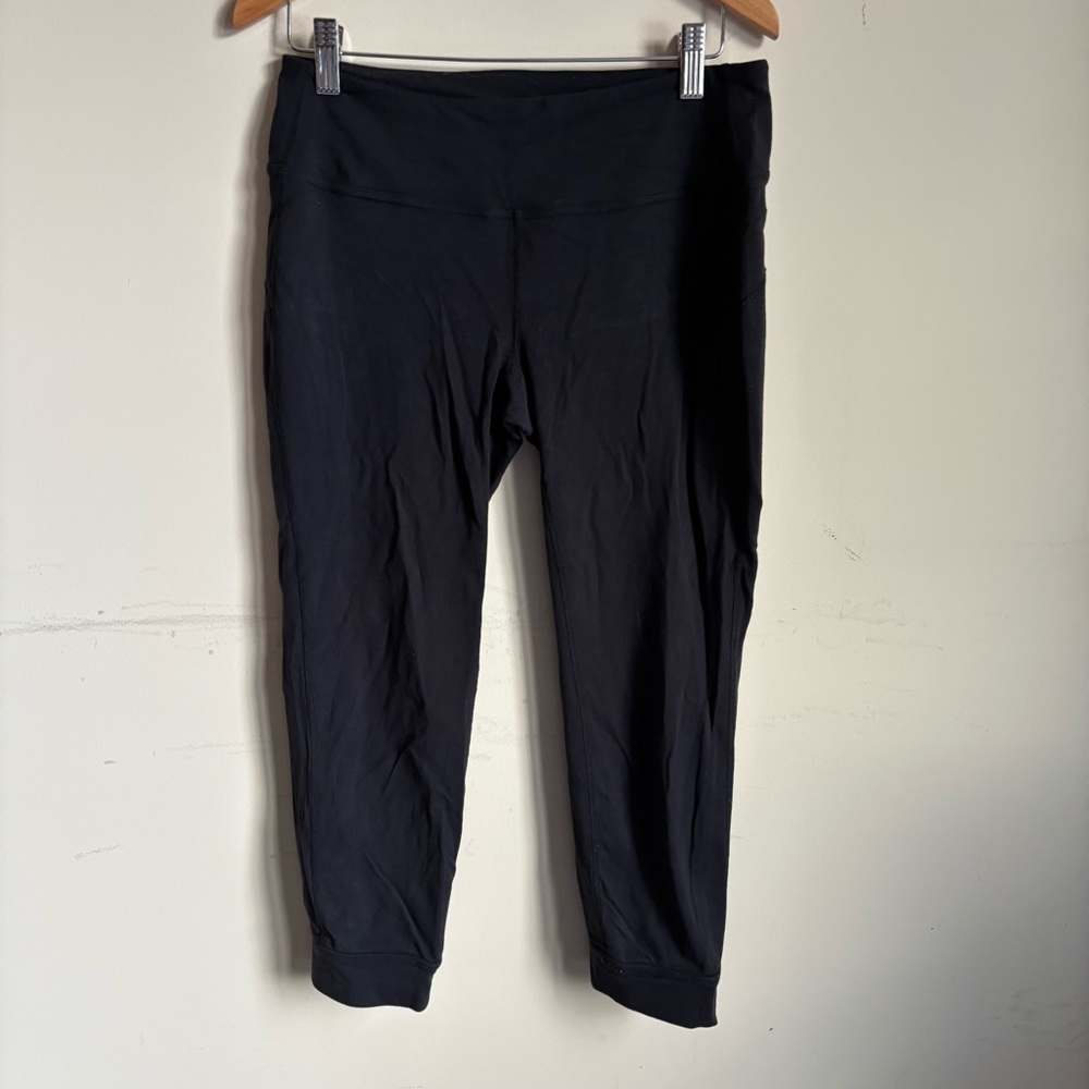 Athleta Black Cropped Leggings with criss cross calf detail
